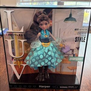 Stylish Doll in Teal Polka Dot Dress